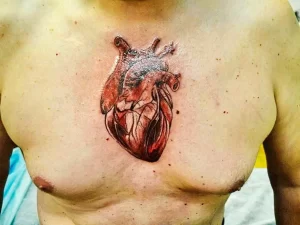 Фото тату на грудине сердце 02.01.22 №0010 - tattoo heart - tattoo-photo.ru