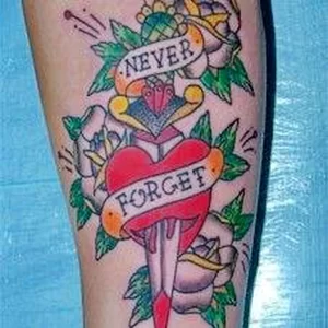 Фото тату нож в сердце 02.01.22 №0009 - tattoo heart - tattoo-photo.ru