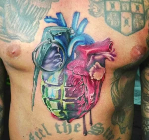 Фото тату сердце граната 02.01.22 №0008 - tattoo heart - tattoo-photo.ru