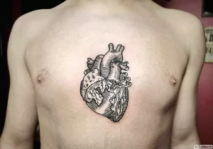 Фото тату сердце на груди 02.01.22 №0028 - tattoo heart - tattoo-photo.ru