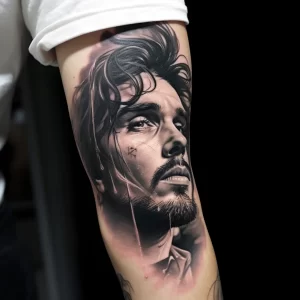 A man with a realistic portrait tattoo on his arm fi dec a bee ccfbaa tattoo-photo.ru 021