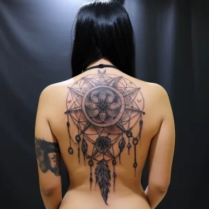 A woman with an artful tattoo of a dreamcatcher on h dba abd a ac eefaea _1 tattoo-photo.ru 075