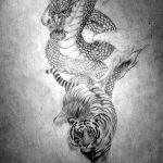 фото тату тигр и дракон 07.12.2018 №001 - tattoo tiger and dragon - tattoo-photo.ru