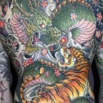 фото тату тигр и дракон 07.12.2018 №015 - tattoo tiger and dragon - tattoo-photo.ru