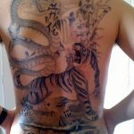 фото тату тигр и дракон 07.12.2018 №034 - tattoo tiger and dragon - tattoo-photo.ru