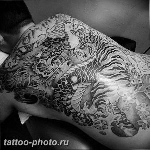 фото тату тигр и дракон 07.12.2018 №045 - tattoo tiger and dragon - tattoo-photo.ru