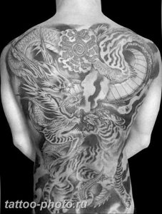 фото тату тигр и дракон 07.12.2018 №056 - tattoo tiger and dragon - tattoo-photo.ru