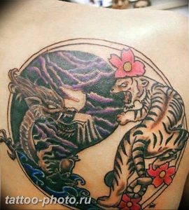 фото тату тигр и дракон 07.12.2018 №087 - tattoo tiger and dragon - tattoo-photo.ru