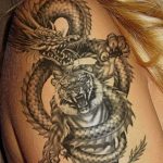 фото тату тигр и дракон 07.12.2018 №093 - tattoo tiger and dragon - tattoo-photo.ru