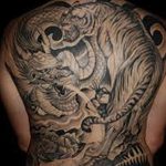 фото тату тигр и дракон 07.12.2018 №049 - tattoo tiger and dragon - tattoo-photo.ru