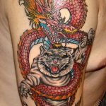 фото тату тигр и дракон 07.12.2018 №089 - tattoo tiger and dragon - tattoo-photo.ru